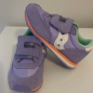 Saucing purple sneakers